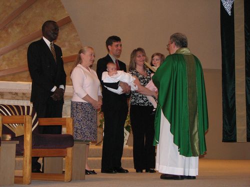 The baptism was performed by Father Angelovic